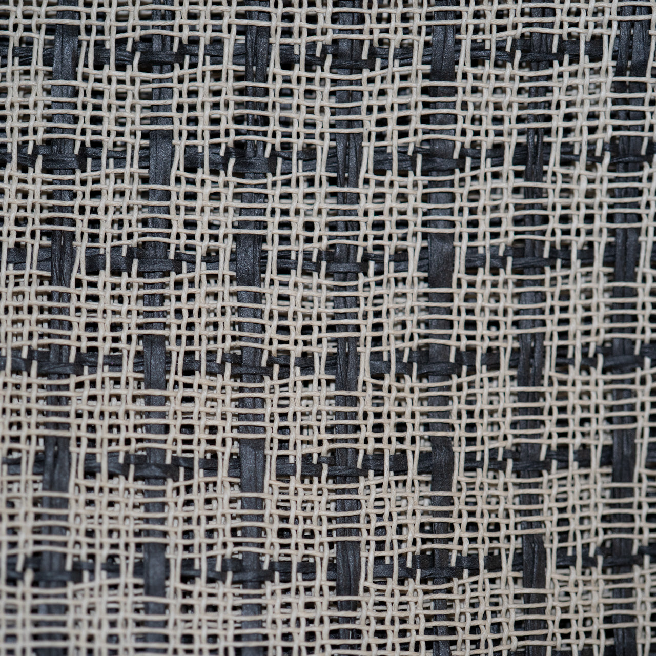 Textured fabric with black and beige pattern