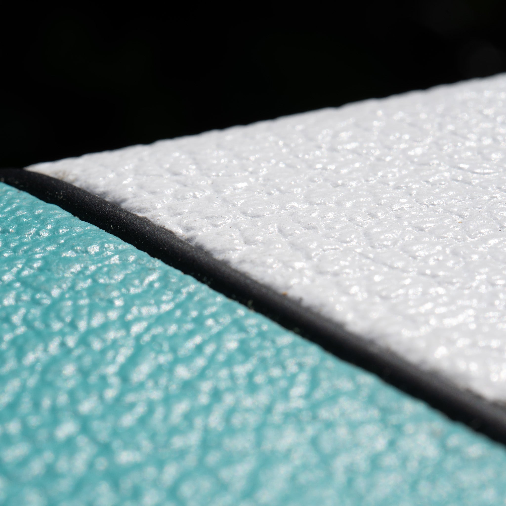 Close-up of a Teal & White Narrow Panel 5E3 Deluxe Amplifier Cabinet with textured custom wrap.