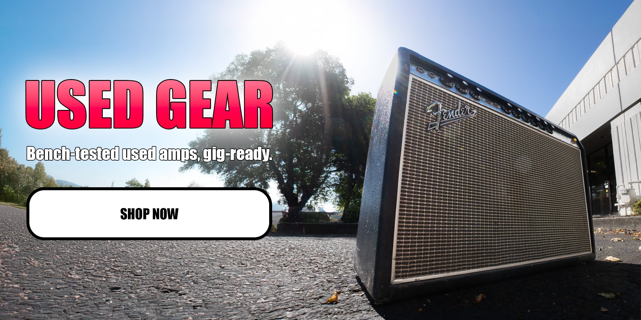 Fender amplifier on a street with 'Used Gear' text and 'Shop Now' button.